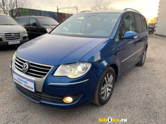 Volkswagen Touran 2.0d AMT 140 л.с.