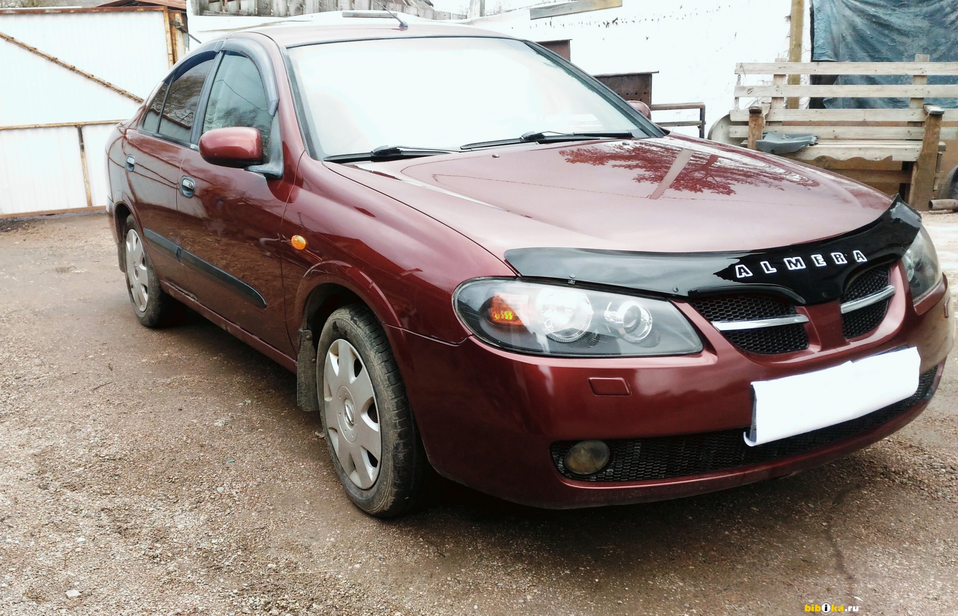 Nissan Almera бордовая 2005