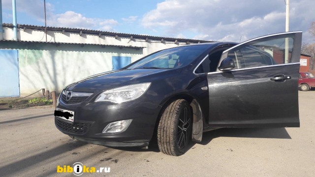 Opel Astra H 1.6 MT (105 л.с.) 