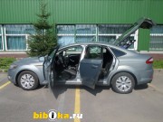 Ford Mondeo 4  1.8 TDCi MT (125 ..) 