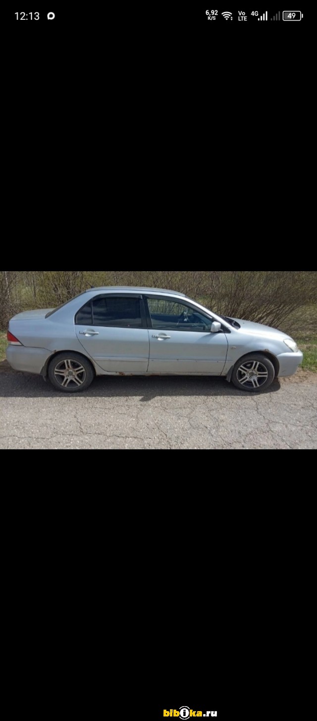 Mitsubishi Lancer 6 поколение [2-й рестайлинг] 1.6 AT (98 л.с.) 